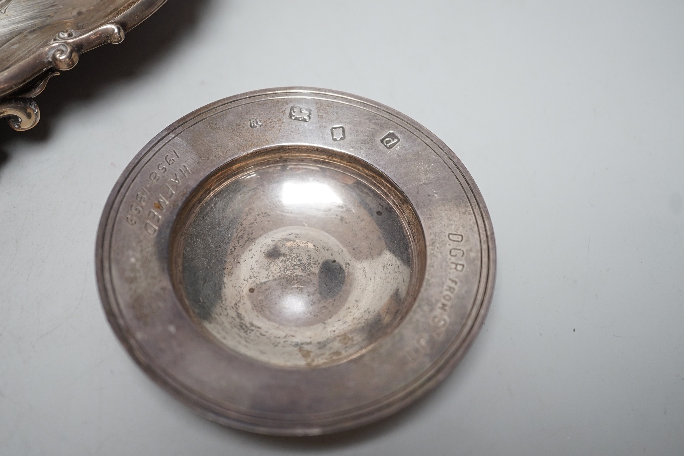 A Victorian silver salver, by The Barnards, London, 1847, 23.1cm, together with a chased silver christening cup, a presentation pin dish, a further novelty dish in the form of a bonnet and a George III silvetr tumbler cu